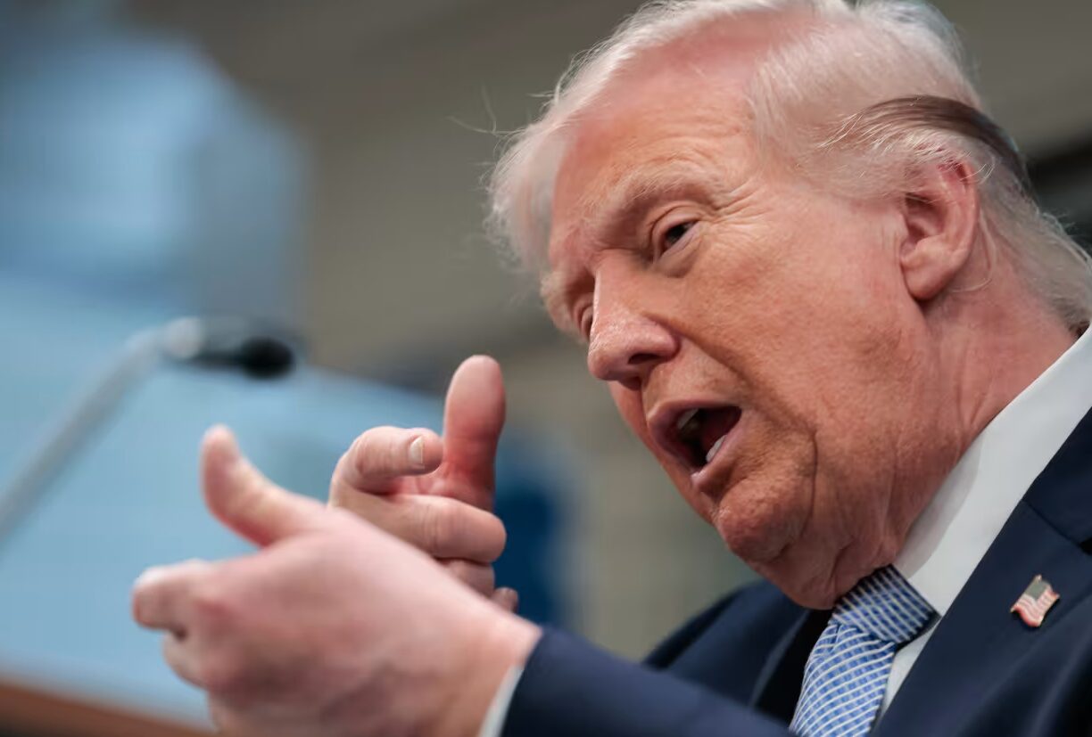 Trump speaking at White House podium about tariffs